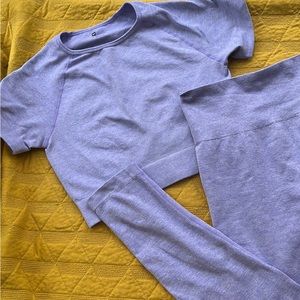 Purple athletic crop top and pants